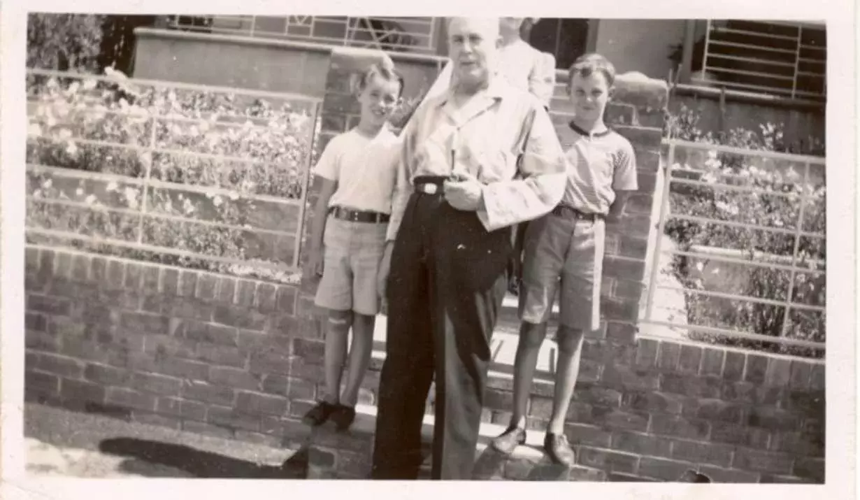 Ben Chifley with children at the front gate of his home at 10 Busby St, Bathurst 