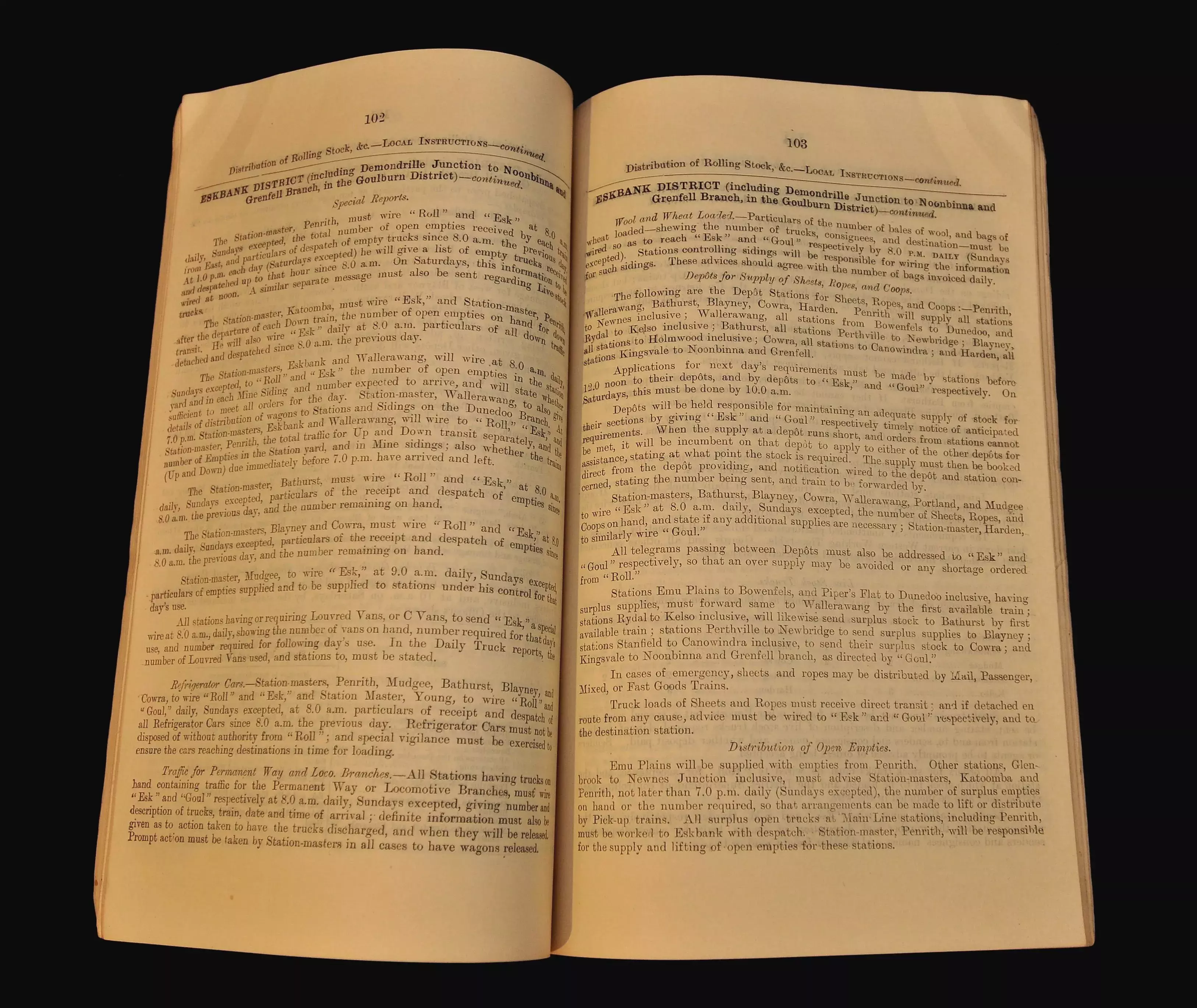 A brown papered old manual opened to a page in the middle.