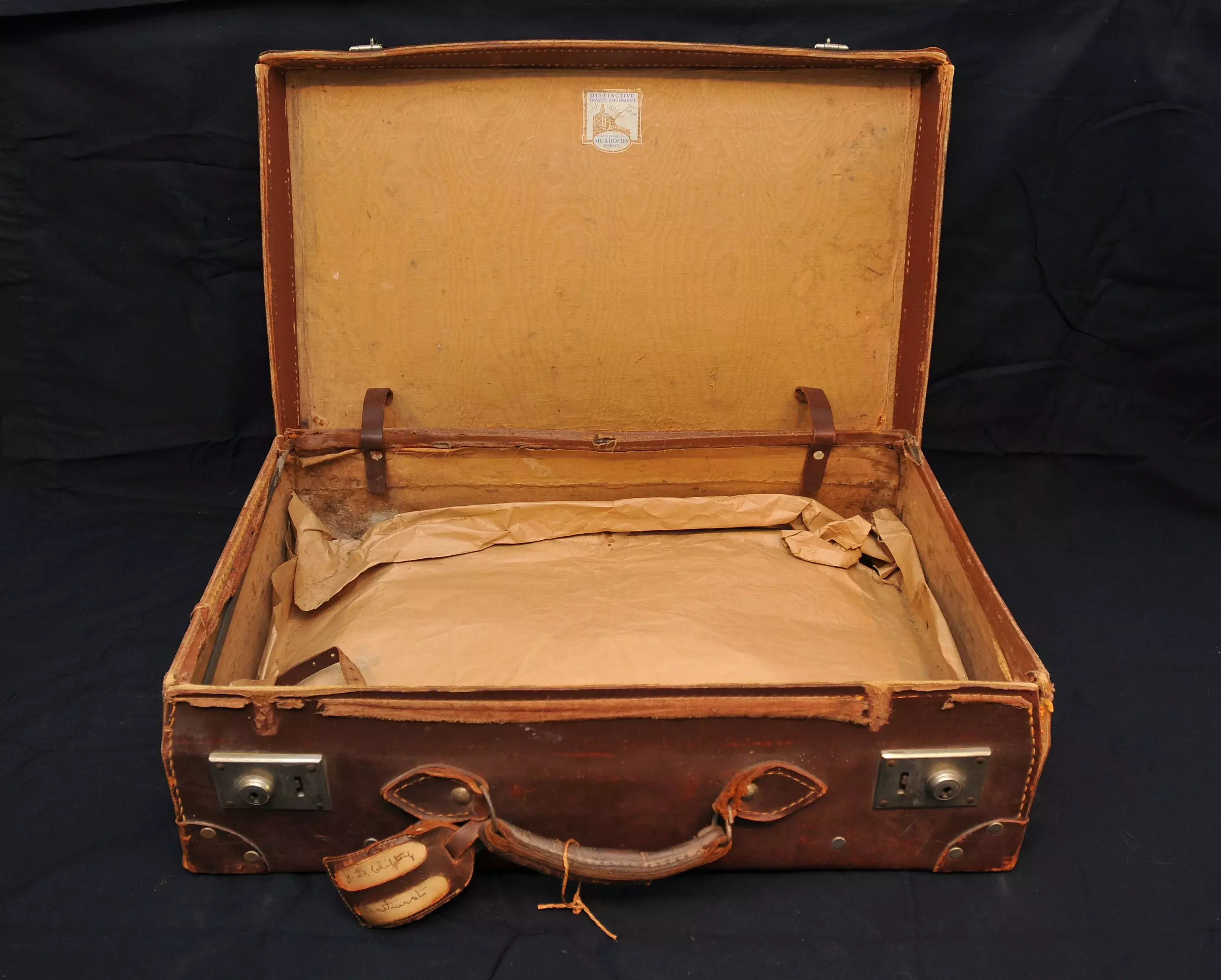 An open leather suitcase 