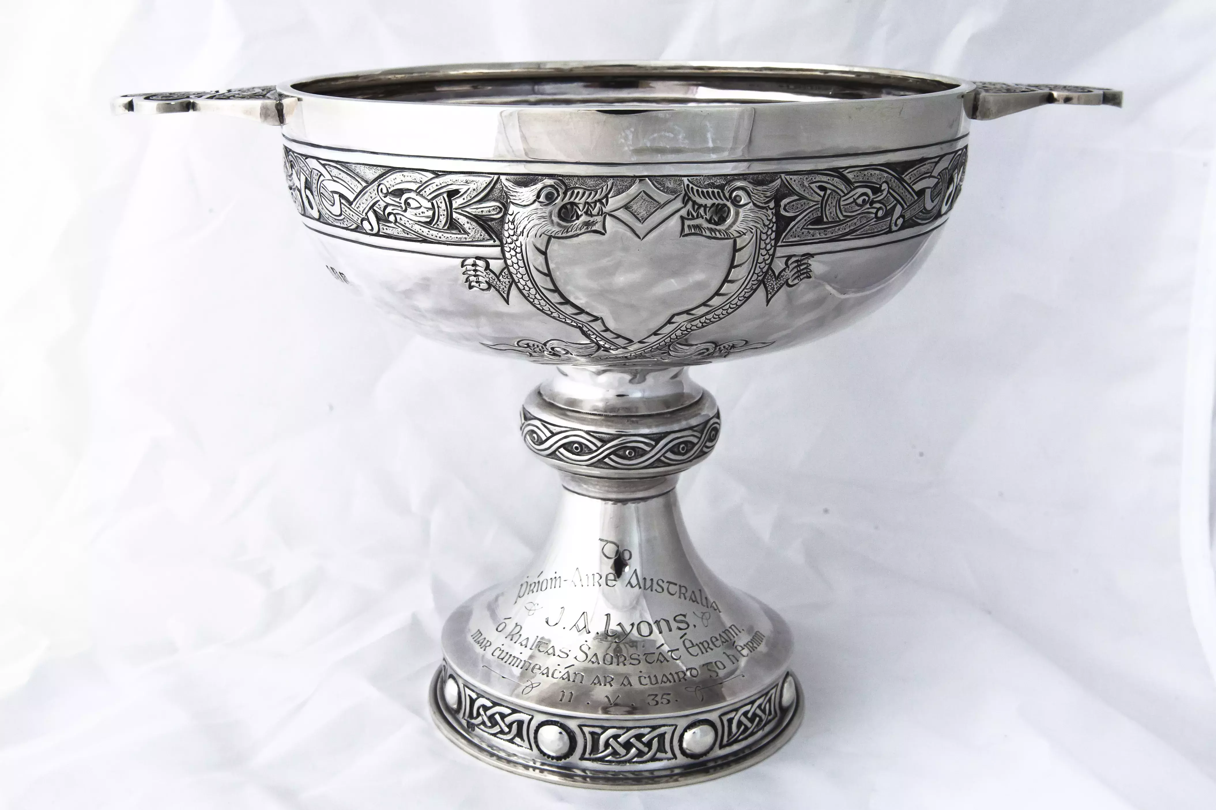 An ornate silver goblet with engraved decorations