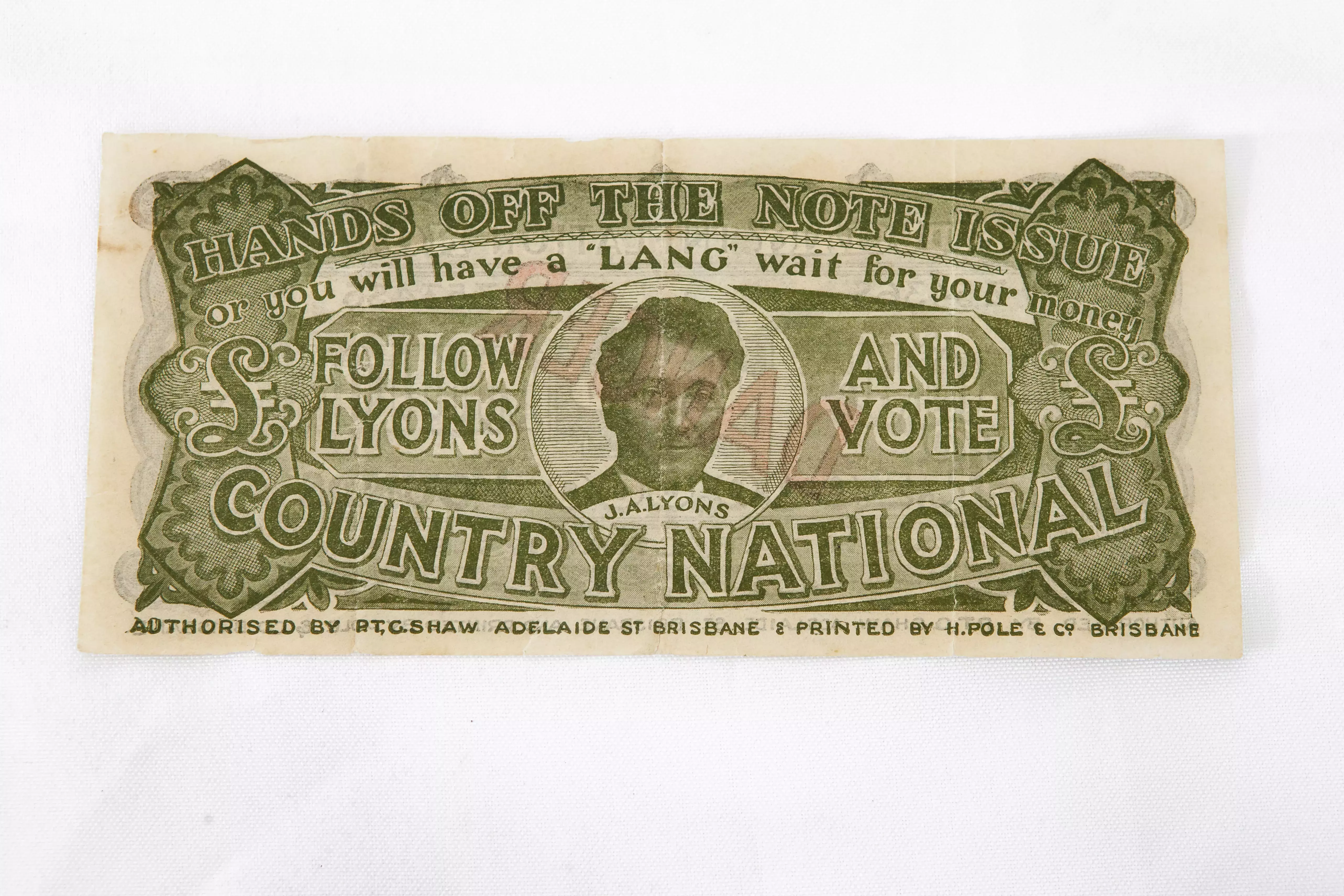 A million pound note of currency with green and white text that reads 'Follow Lyons and vote, Country National' 